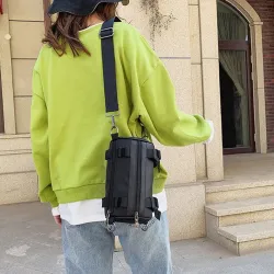 Moderigtig lille crossbody-taske - cylinderformet - unisex