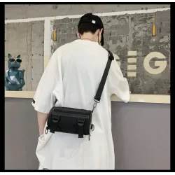 Moderigtig lille crossbody-taske - cylinderformet - unisex