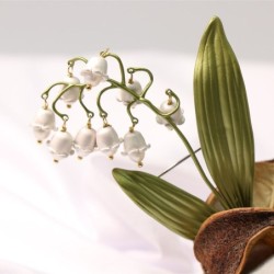 Liljekonval broche