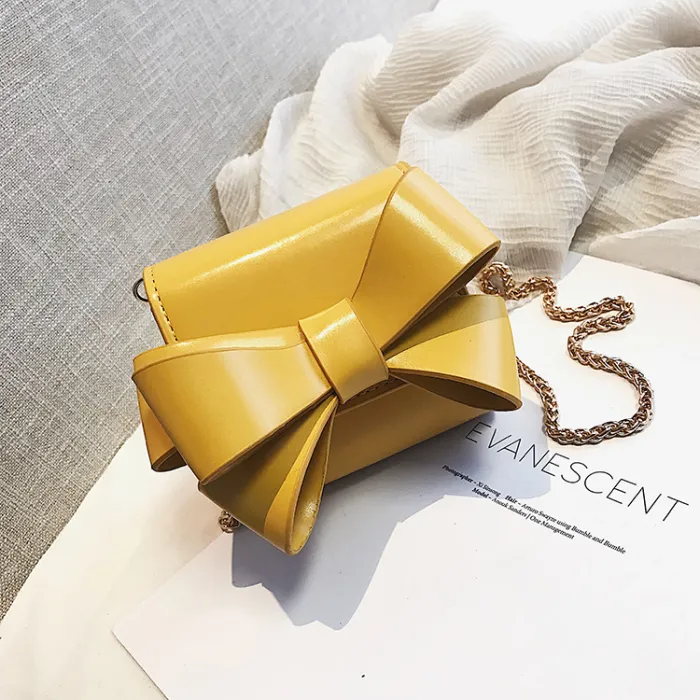 Small elegant bag with bow & chain