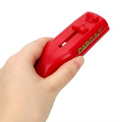 Cap gun - bottle opener - shoots the cap away