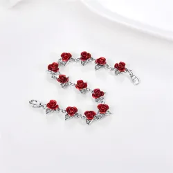 Gold & silver bracelet with red roses