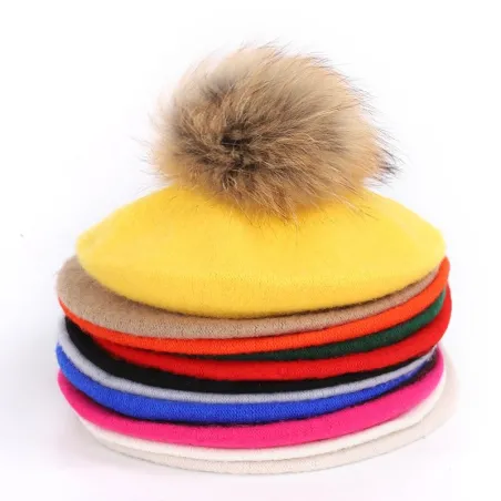 Elegant beret with fur pom-pom