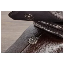 Fashionable crossbody leather bag with leaves patternBags